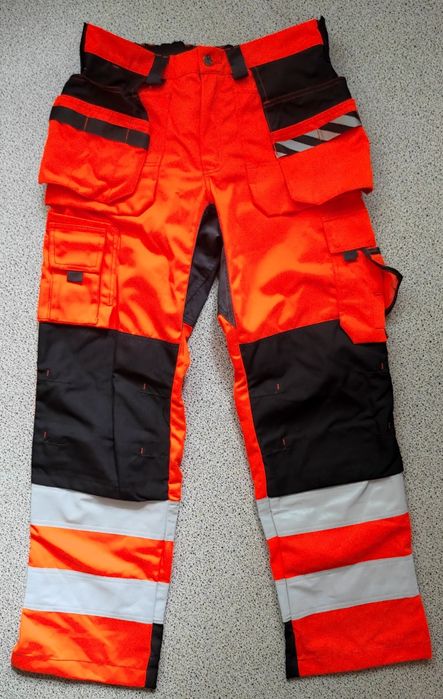 Робочі штани Dimex зі світловідбиваючими елементами. 54 розмір