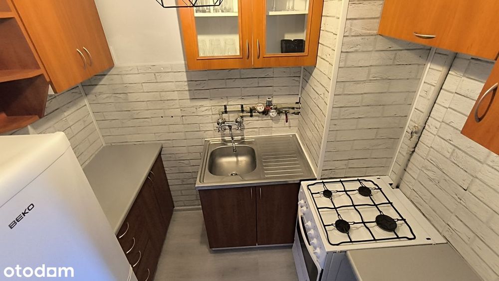 przytulny pokój z kuchnią