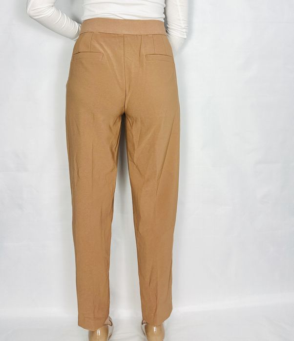 Beżowe spodnie z wysokim stanem M 38