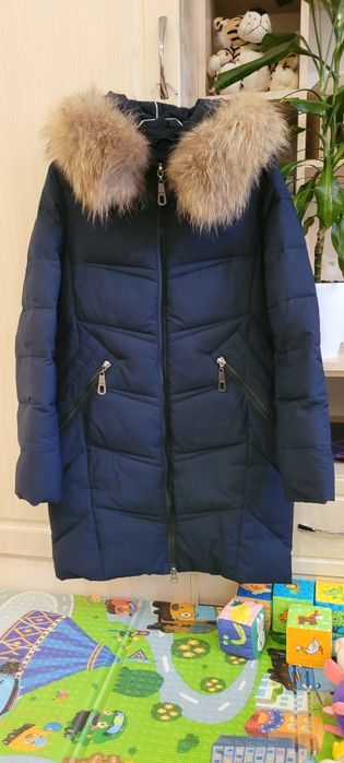 Тепле жіноче зимове пальто з натуральним хутром