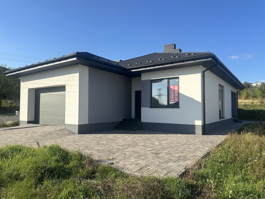 Продам будинок -американку . Газ , гараж , 8 соток двлянка
