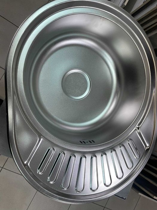 Кухонна мийка кругла з місцем для сушіння