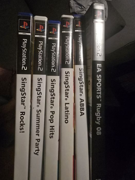 Playstation 2 slim (ps2) + comando + eyetoy + microfones singstar