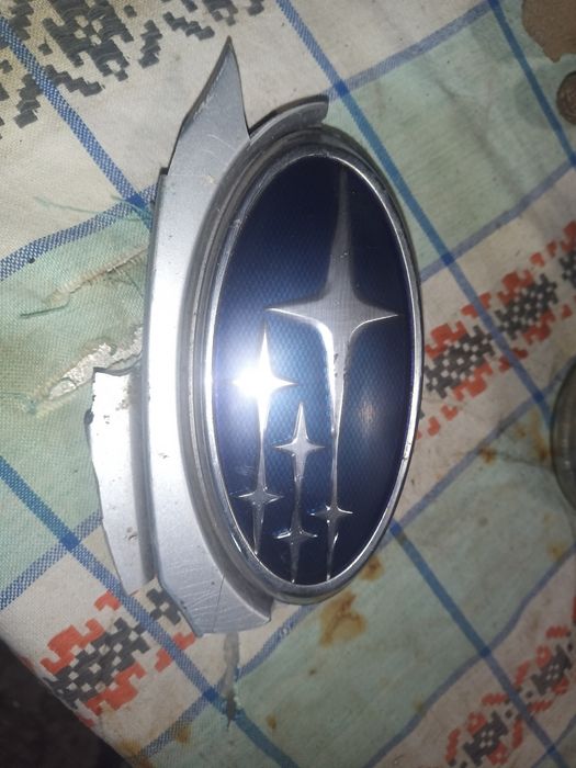 Эмблема Subaru Outback BR