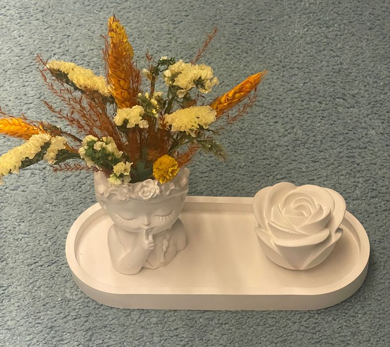 Conjuntos em gesso com flores