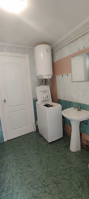 Продається одноповерховий цегляний будинок земельною ділянкою