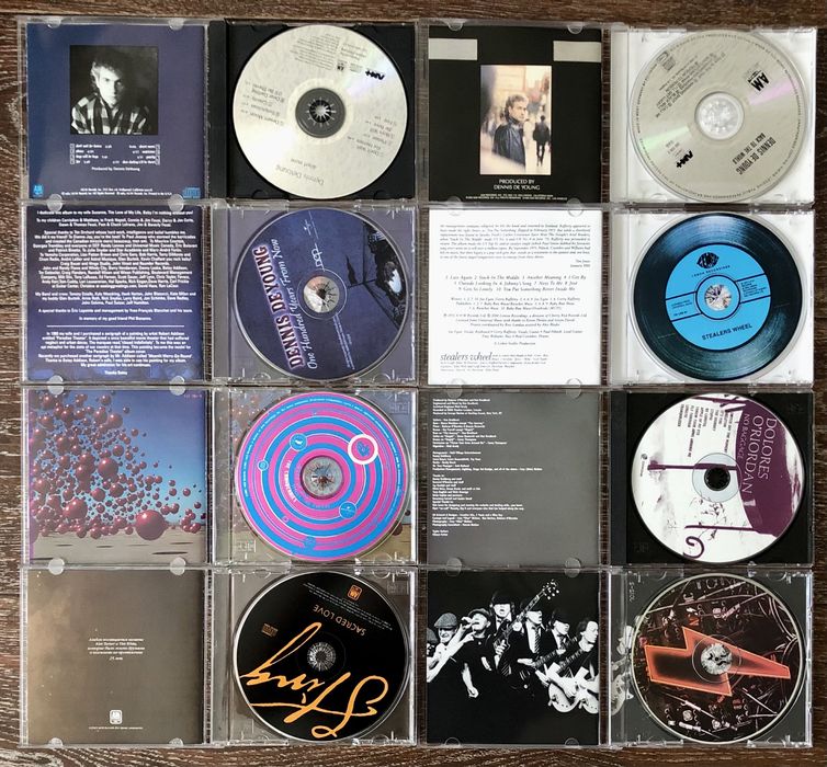 CD диски. Sting. Styx. AC/DC. Cranberries. Stealers Wheel. Dennis De Young.