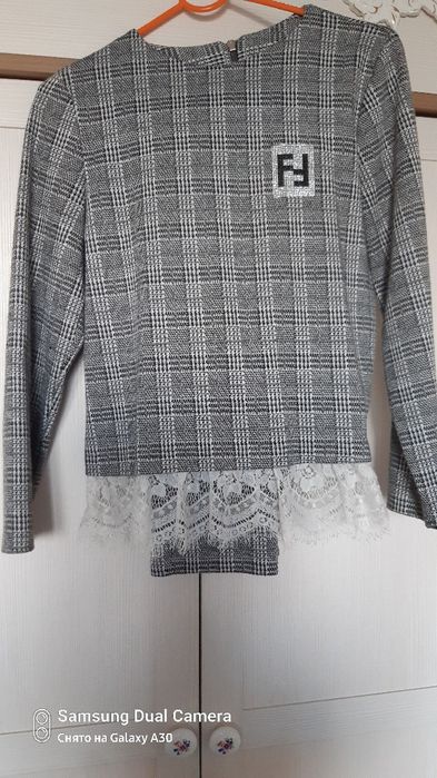 Брючний костюм на дівчинку 9=10 років