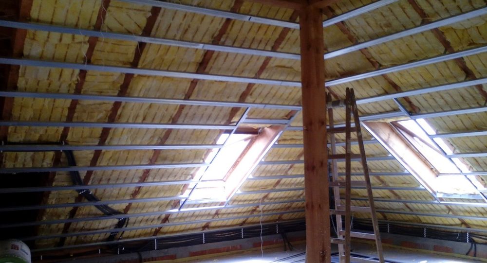 Ocieplenia poddasza wełną zabudowa g/k nida
