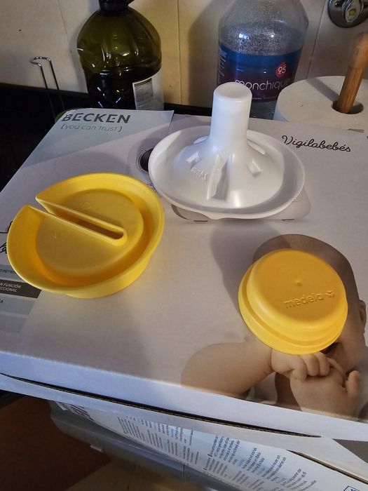 Bomba de tirar leite e camara de quarto