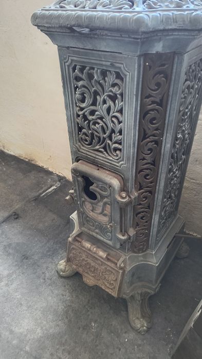 Stary emaliowany piecyk kominek koza