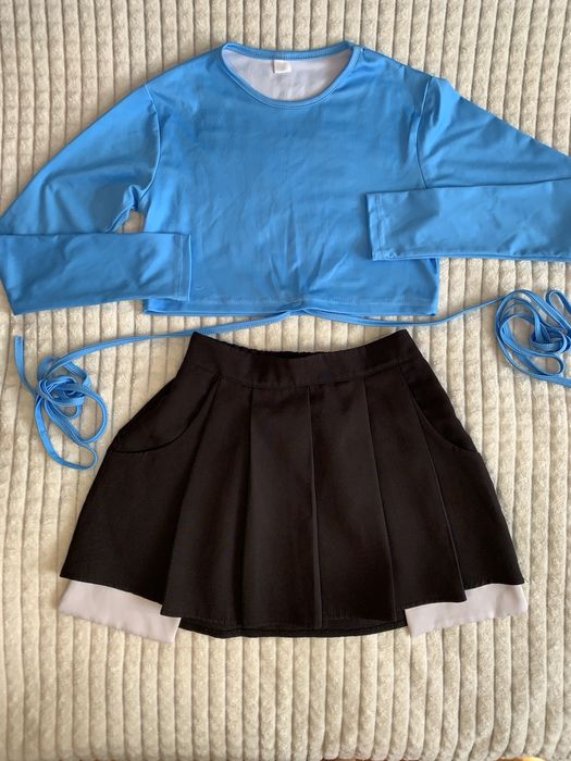 Спілниця та топ костюм