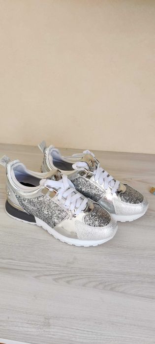 Жіночі кросівки Philipp Plein срібло.