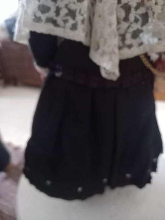 Boneca vestida com trage Viana