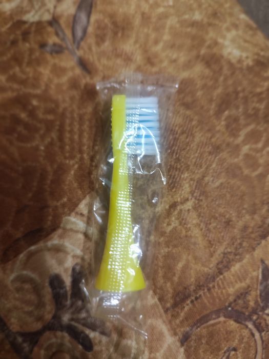 Додаткова насадка до жовтої електричної зубної щітки з дракончиком