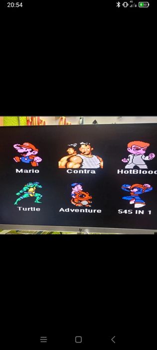 Mini Consola  com 1 comando e muitos jogos antigos