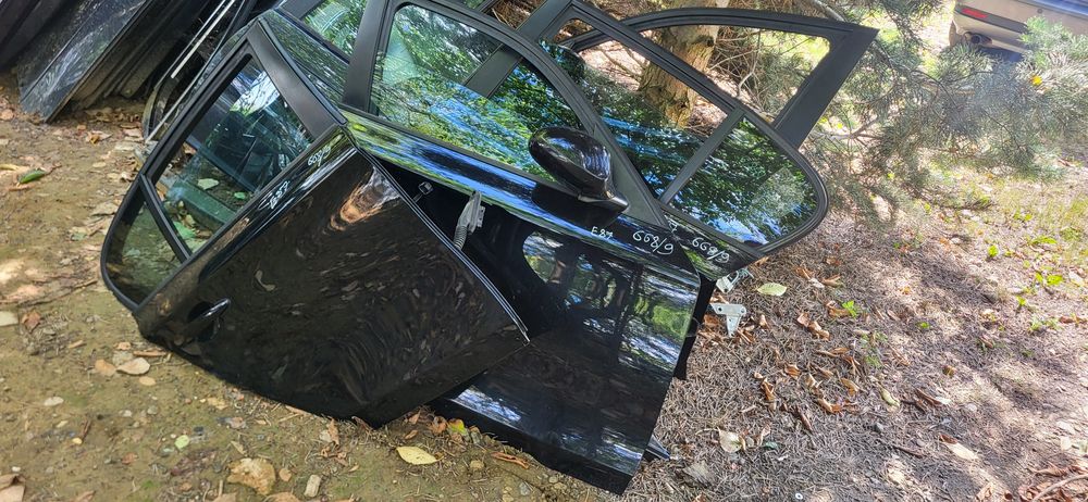 Drzwi BMW 1  E87  Lift Gołe Prawe Lewe Przód Tył 668/9  szyba Zamek