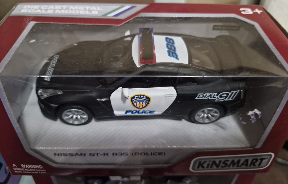 Металева модель Поліція Kinsmart,  Автосвіт, Nissan, пікап