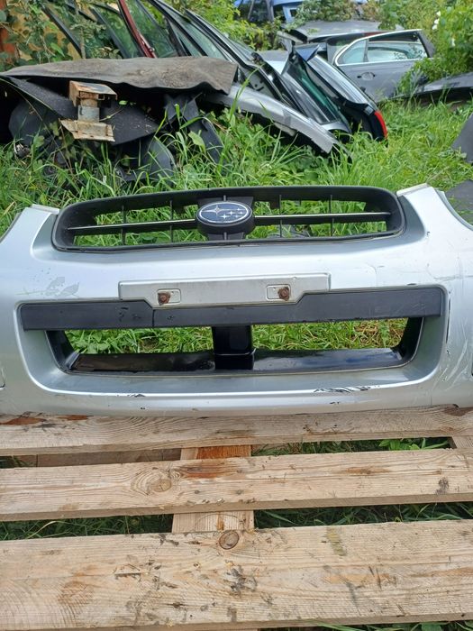 Subaru Impreza 03-05 рік передній бампер бампера 57704FE080