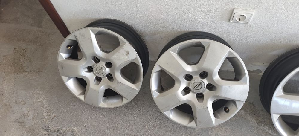 4 jantes de ferro com tampões Opel Astra H