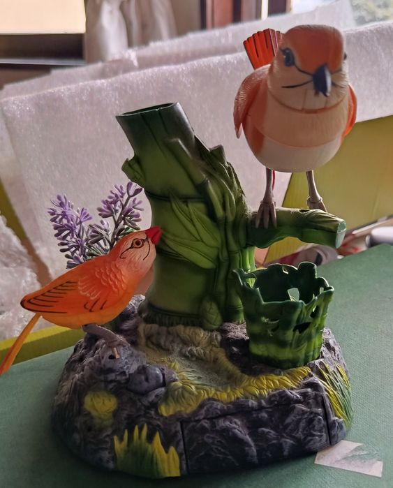 Peça decorativa com pássaros