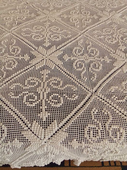 Colchas de renda feitas à mão