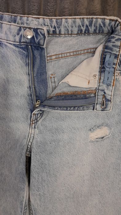 Джинсы палаццо с разрезами