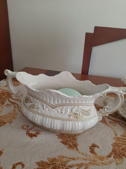 Two ceramic table centerpieces442868344512194561