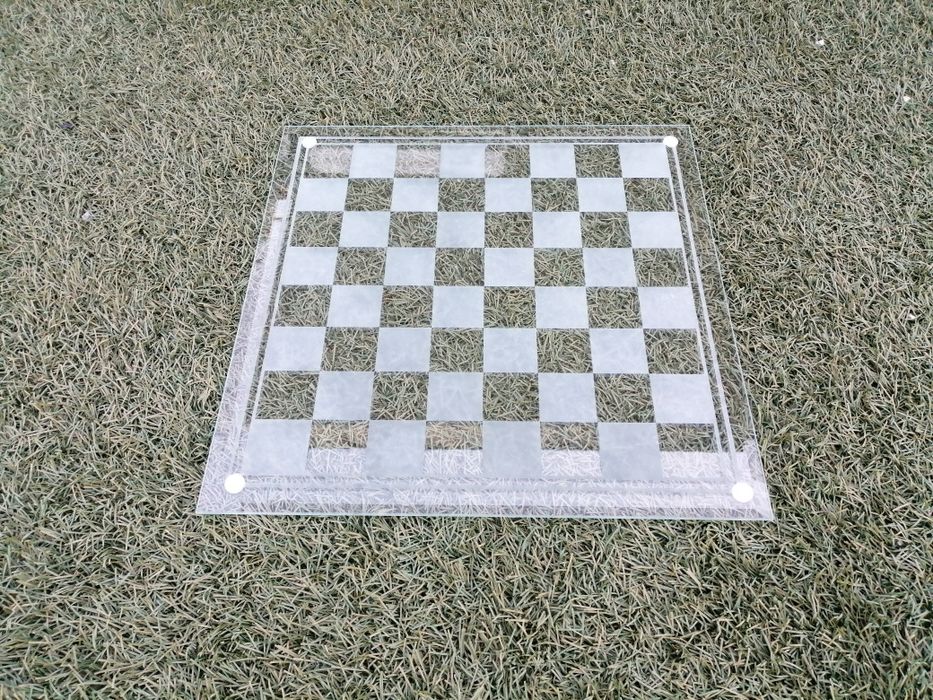 Jogo de damas e xadrez em vidro