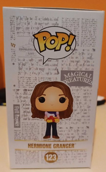 Funko Pop Hermione holding gift