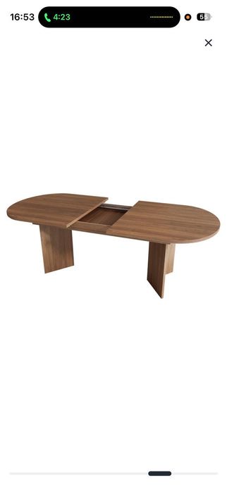 Mesa de jantar extensível e robusta com cantos arredondados e tampo espesso