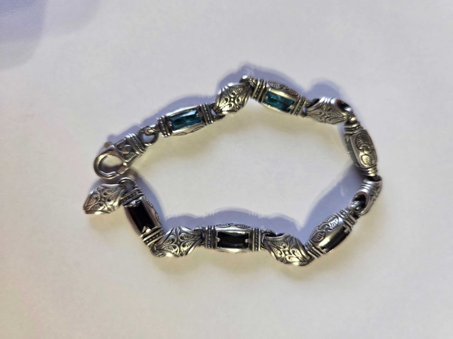 Серебряный браслет мужской с камни.