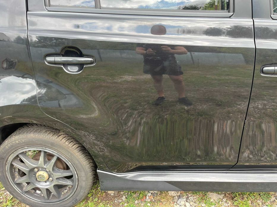 drzwi tył tylne tylnie prawe daihatsu materia x07 czarne 2006 - 2011