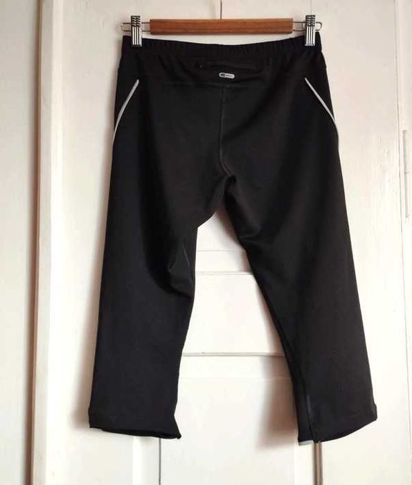 Czarne legginsy spodenki kolarki rybaczki damskie Puma sportowe