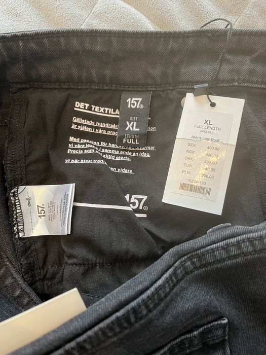 Темно сірі кльошові джинси р XL