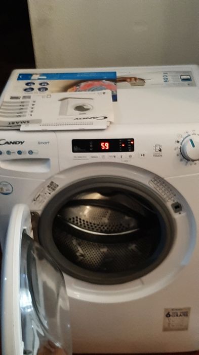 Máquina de lavar roupa Candy