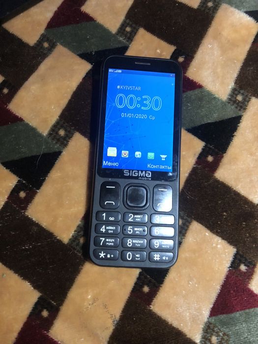 Кнопочний телефон