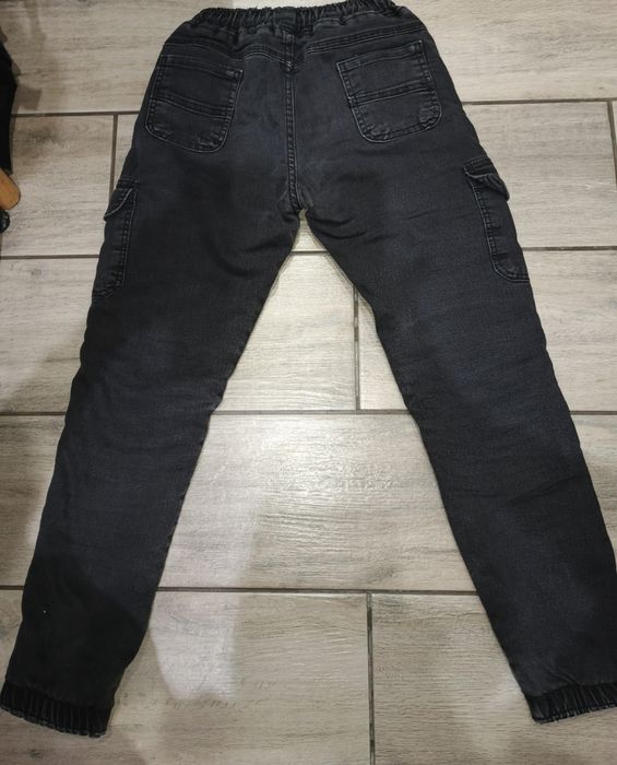 Утеплені джинси на хлопчика 10-11 років.