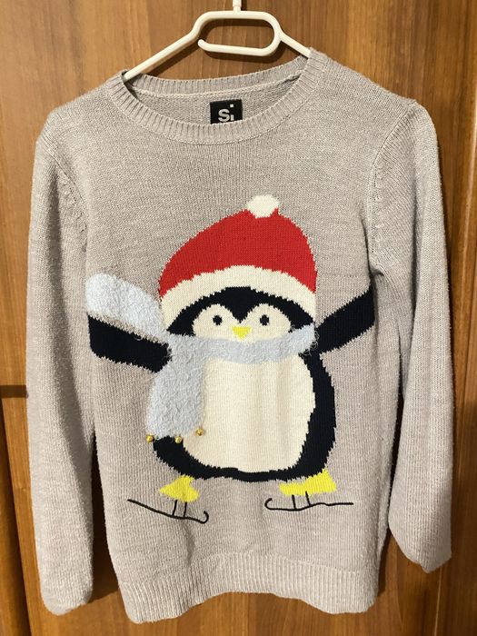 Świąteczny sweter z pingwinem