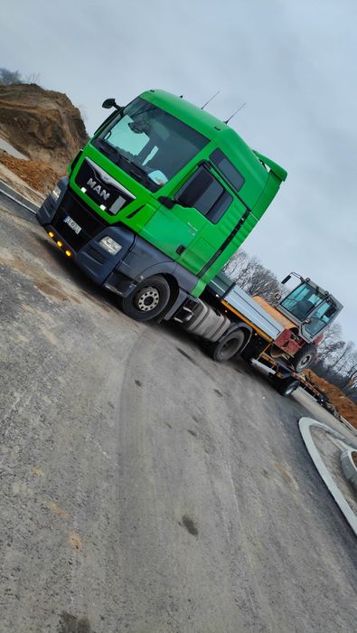 Pomoc drogowa, holowanie, transport maszyn, laweta, niskopodwozie