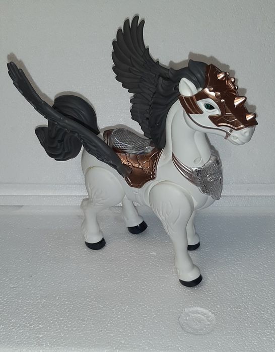 Игрушка  музыкальная  - лошадка  Пегас