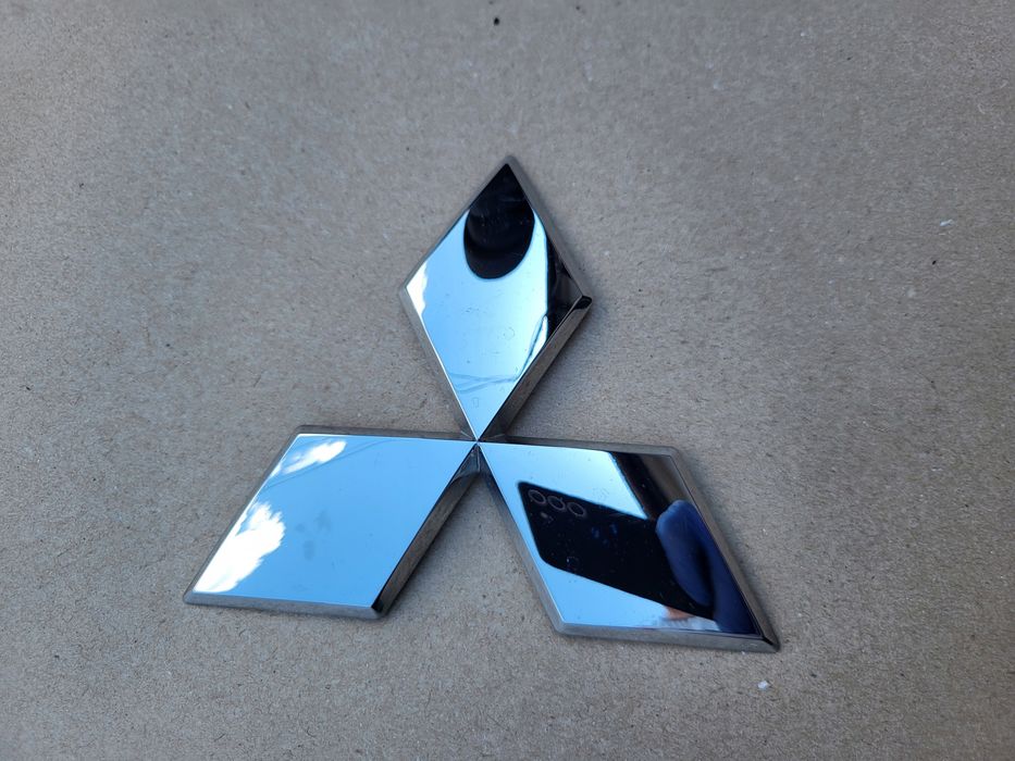 znaczek logo emblemat atrapy przód mitsubishi space star oe 7415a560 125 mm
