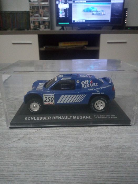 Vendo viaturas participantes no rally Dakar