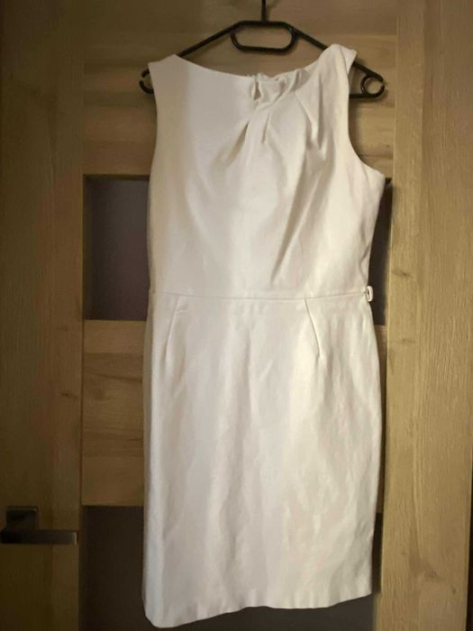 Biała sukienka z Mango rozmiar L.