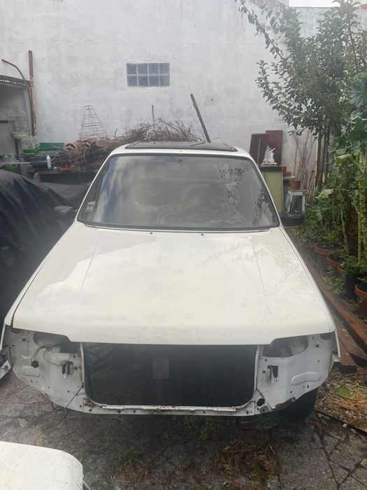 Carroçaria Peugeot 205 3 portas (portas capo eixo carrion. Suspensão frente) também periféricos de Motor 1.4  origem - XS, 106 saxo AX  Vendaseparado