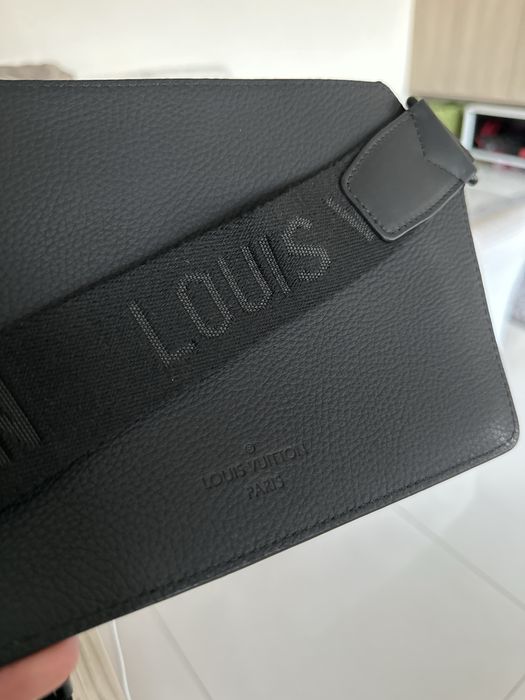 Saszetka skorzana Louis Vuitton TakeOff
