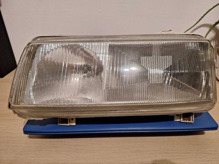 Reflektor lewy, VW Passat B4 Hella