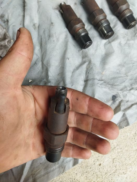 Форсунки від мотора форд ескорт 1.6 дизель