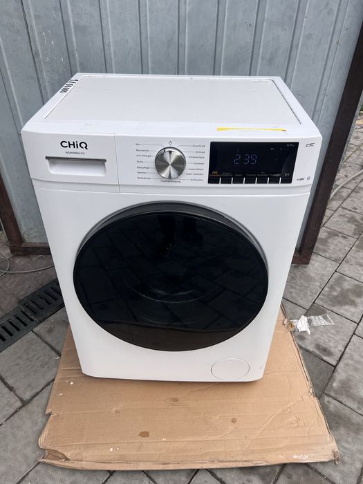 Пральна машина з сушкою. Вузька в глибину