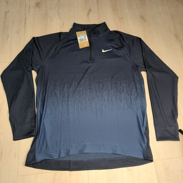 Nike Tour чоловічі Dri-FIT ADV 1/2-Zip для гольфу Top FD5833-410